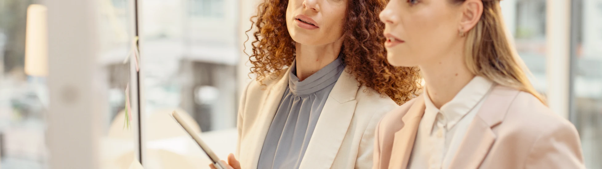 two women at a board